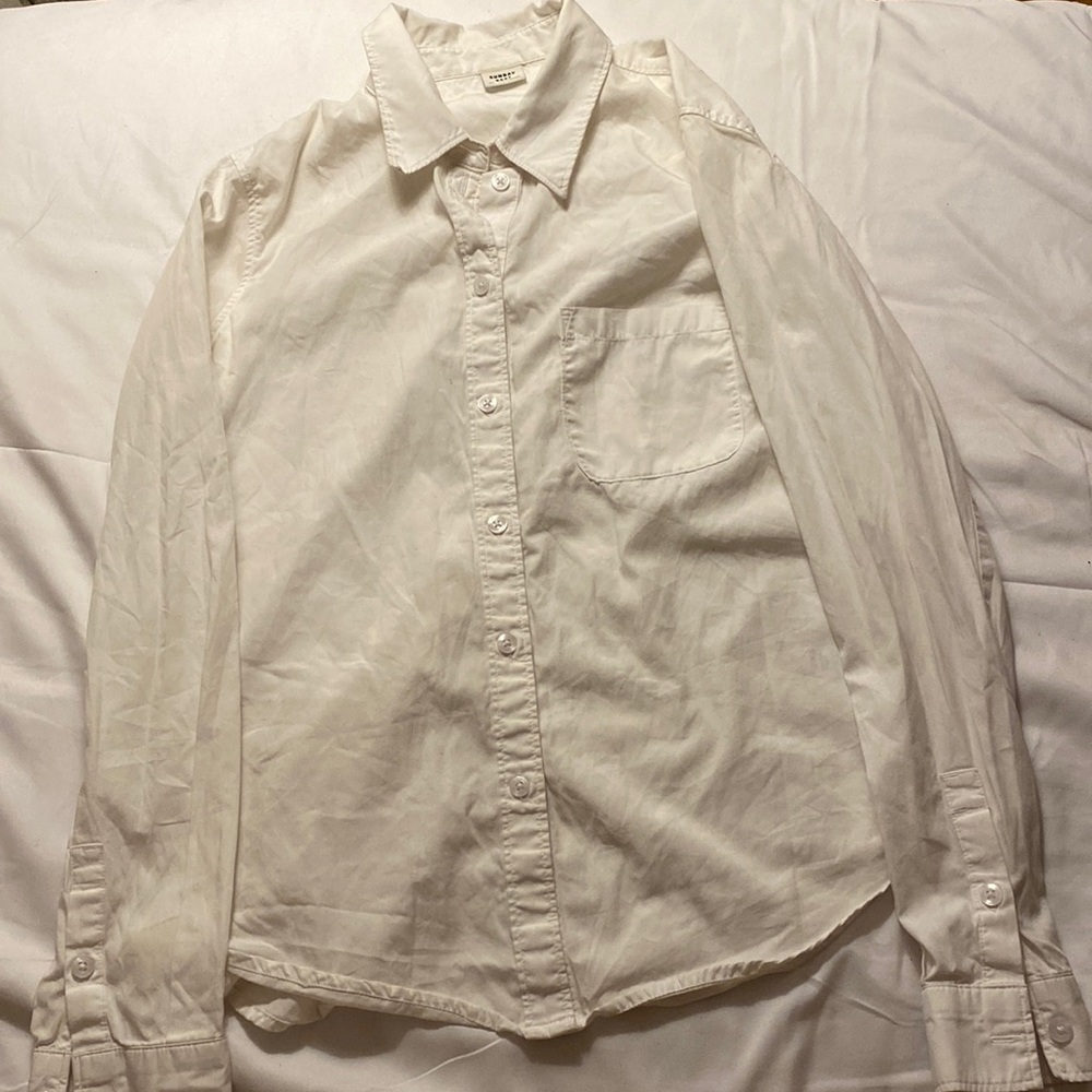 White long sleeved button down from Aritzia’s Sunday Best line. Size XS.